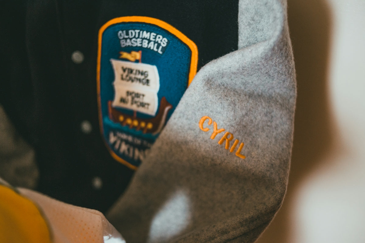 a close up of a jacket with a patch on it